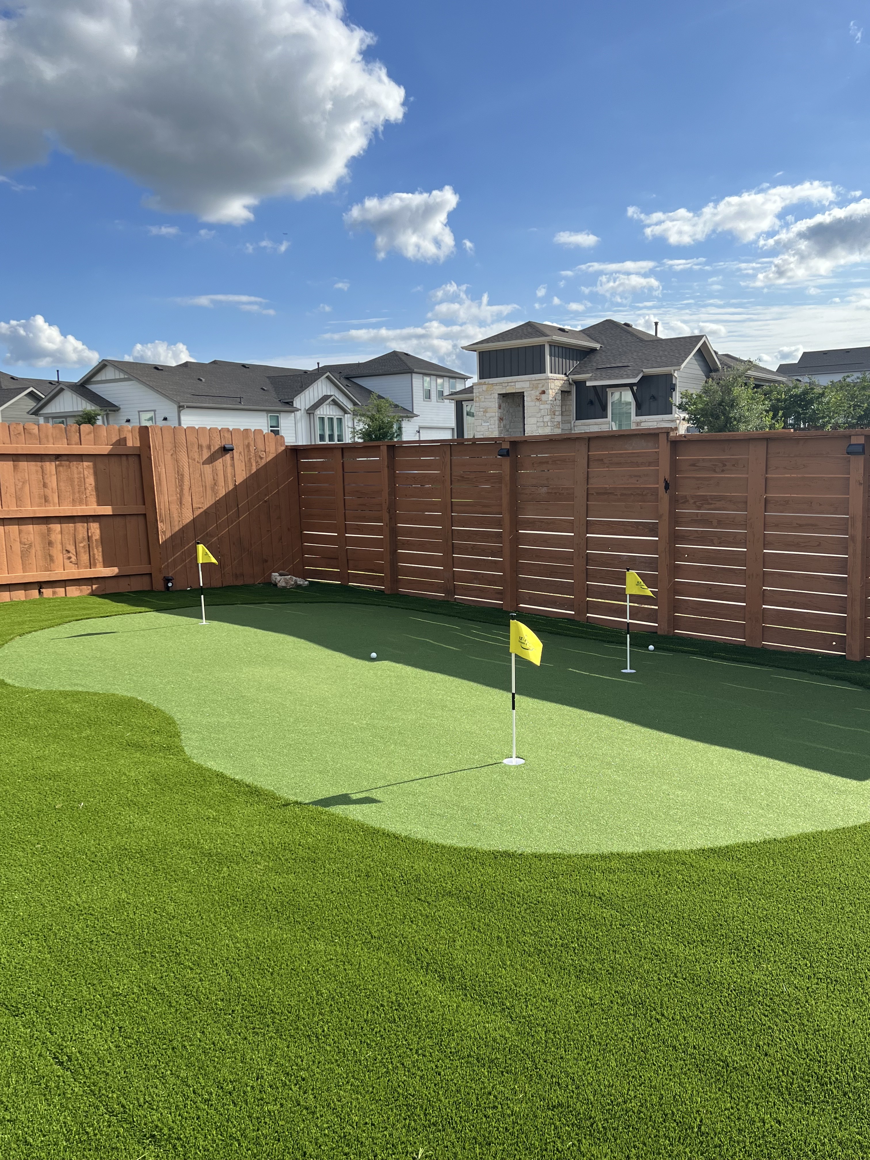 Custom backyard putting green designed and built by EZ Par